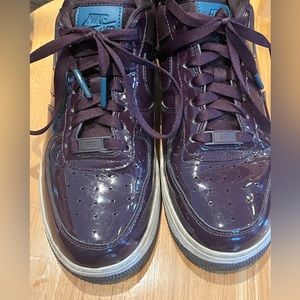 Nike Air Force 1. Purple patent leather sneakers. Women’s size 8. Gently used.
